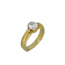 Load image into Gallery viewer, Gold ring with a diamond on a white background
