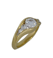 Load image into Gallery viewer, Gold ring with three diamonds on a white background