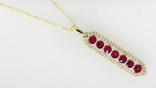 Load image into Gallery viewer, Vertical Ruby &amp; Diamond Halo Pendant in 14K Yellow Gold on 18&quot; Chain
