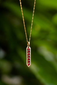 Vertical Ruby & Diamond Halo Pendant in 14K Yellow Gold on 18" Chain