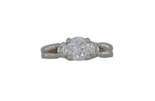 Load image into Gallery viewer, Diamond ring on a reflective white surface
