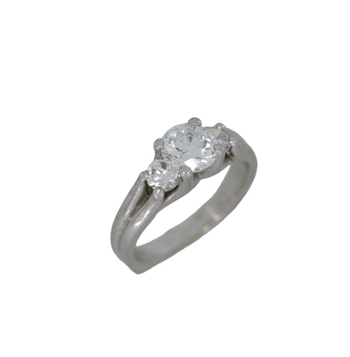 Silver ring with three diamonds on a white background