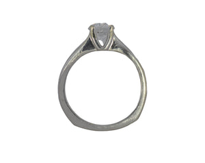 Silver ring with a diamond on a white background