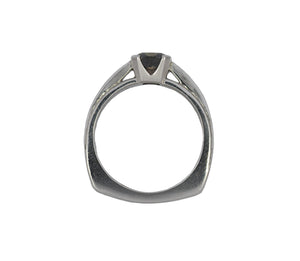 white gold ring with a central brown gemstone on a white background