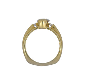 Gold ring with a diamond on a white background