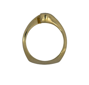 Gold ring on a white background