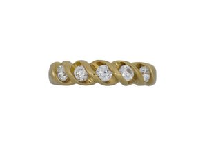 Gold ring with diamonds on a white background