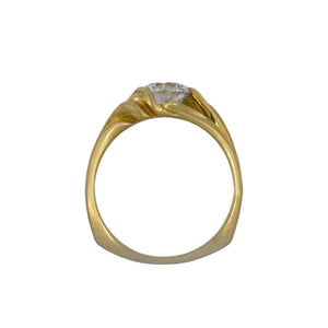 Gold ring with a diamond on a white background