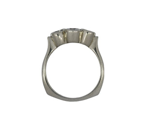 white gold ring with a diamond on a white background