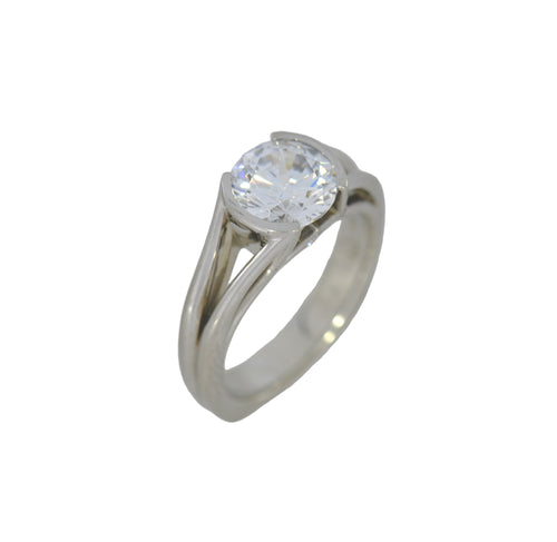 white gold ring with a large diamond on a white background