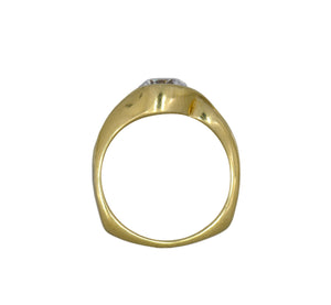 Gold ring with a diamond on a white background