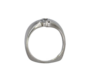 White gold ring with a diamond on a white background