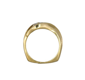 Gold ring with a diamond on a white background