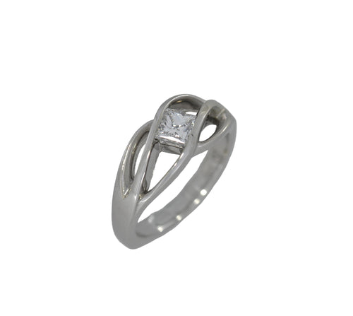 White gold ring with a diamond on a white background