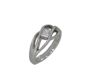 White gold ring with a diamond on a white background