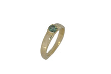 Load image into Gallery viewer, Gold ring with a green gemstone on a white background
