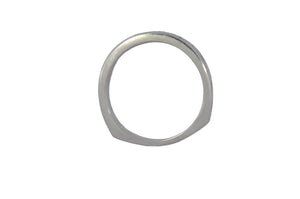 White gold ring on a gray background