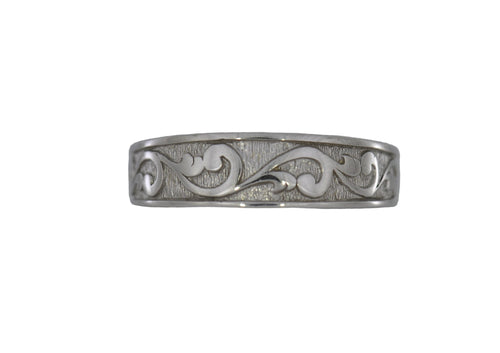 White Gold ring with intricate designs on a white background
