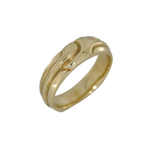 Gold ring on a white background