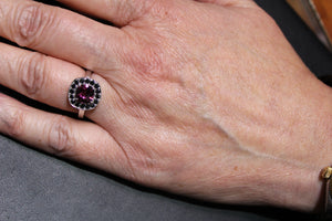 Rhodolite Garnet and Black Diamond Halo Ring