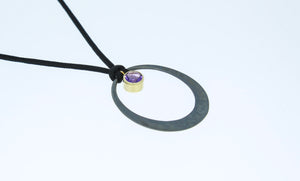 Oval Eclipse Pendant With Amethyst by Toby Pomeroy