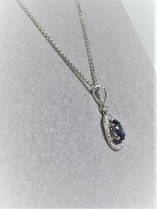 Benitoite and diamond pendant