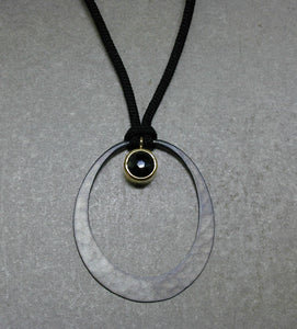 Oval Eclipse with Black Spinel Pendant