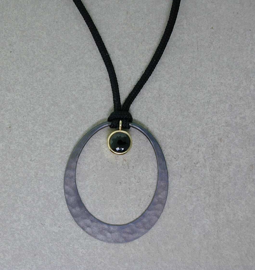 Oval Eclipse with Black Spinel Pendant