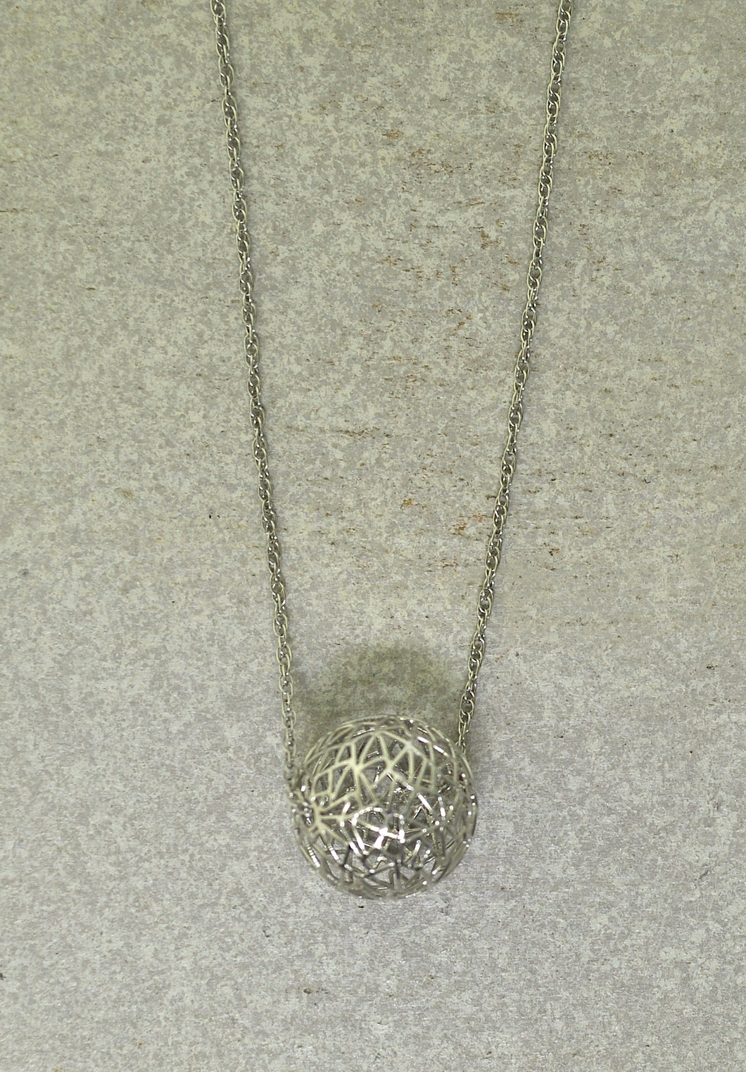 White gold wire sphere necklace
