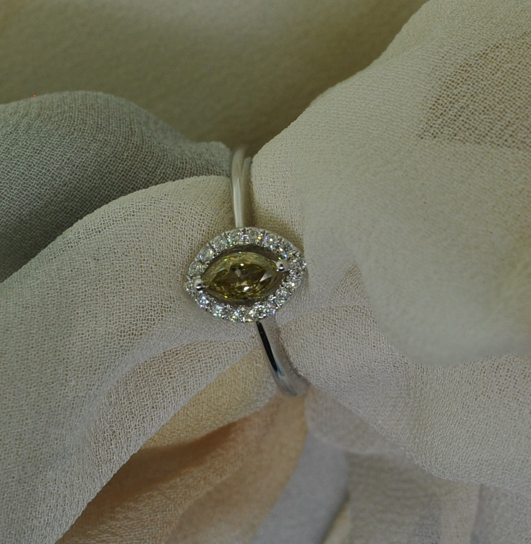Fancy yellow marquise diamond ring