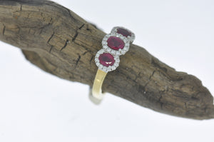 A Spark Creations Three Stone Ruby Ring