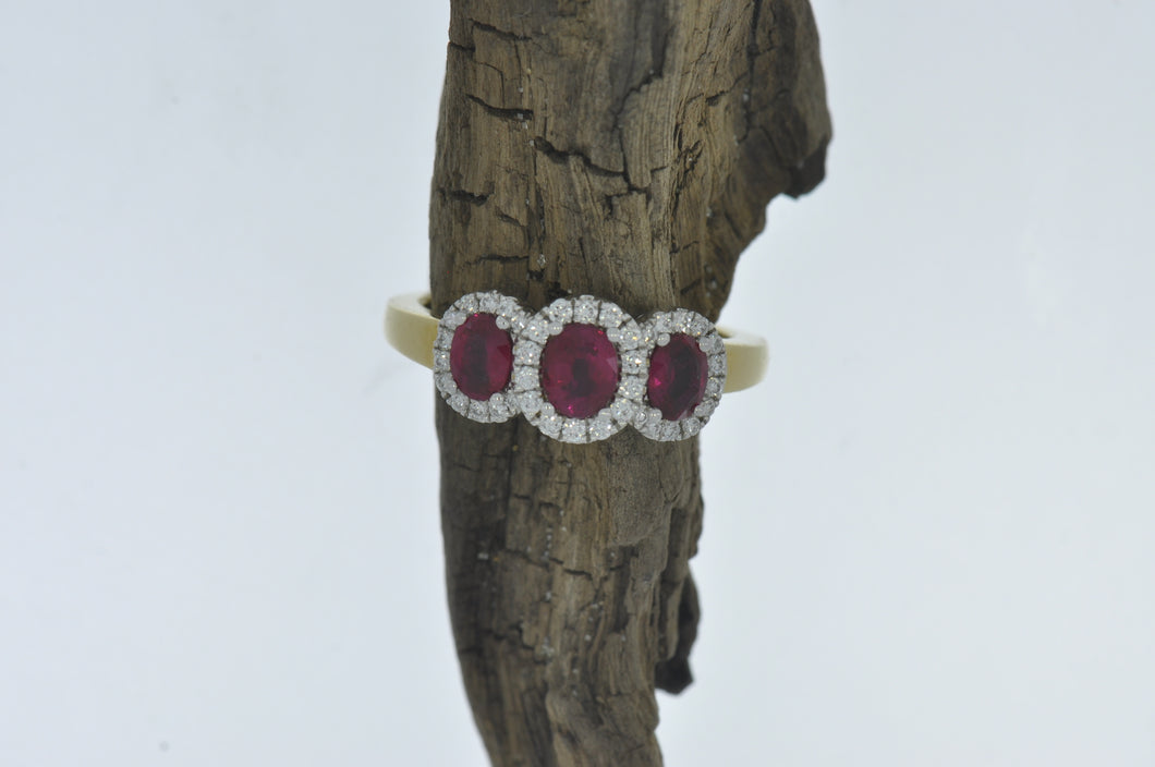 A Spark Creations Three Stone Ruby Ring