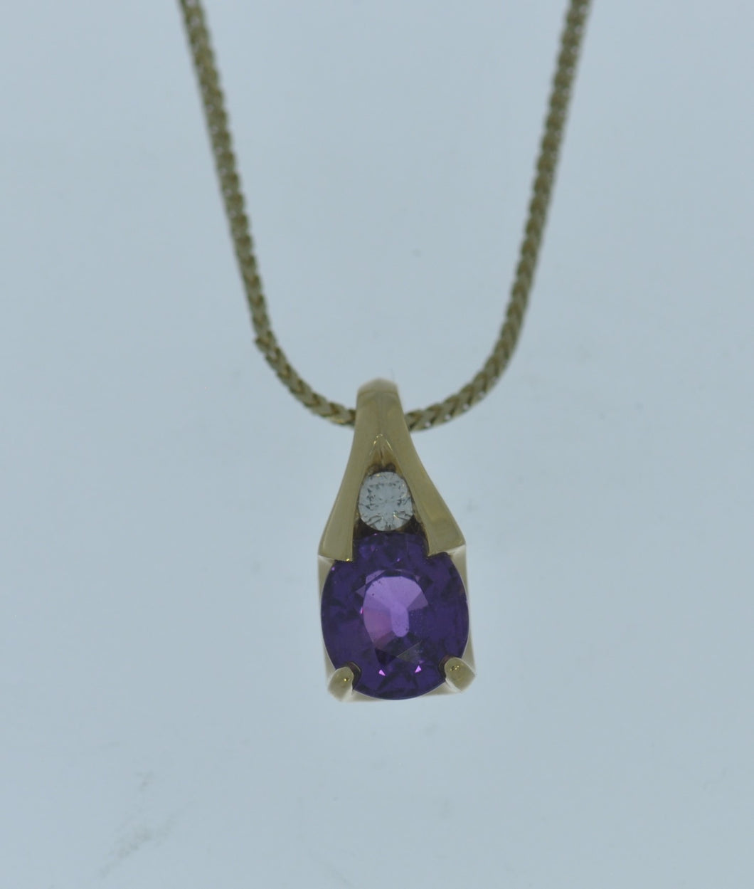 Orion With Purple Sapphire Pendant