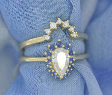 Load image into Gallery viewer, Blue Sapphire Framed Pear Diamond Ring
