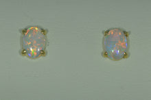 Load image into Gallery viewer, 7 x 5 mm Oval Opal Studs in Yellow Gold
