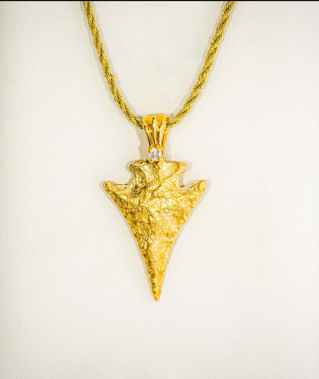 Gold Arrowhead Pendant by Paul Iwanaga